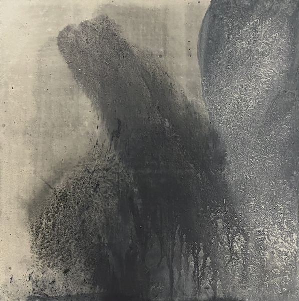 Abstract expressive drawing with black thick pigment on chalk gesso base.