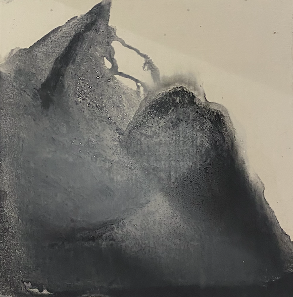abstract painting of a dark blue pigmented ink drawing in the shape of a mountain with a figure inside.