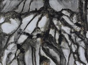 photograph of a painting suggesting great cavernous roots with a figure above on the ground next to the trunk on a grey day